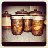 Honey Apple Sauce in their canning jars