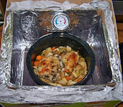 Veggies and chicken in the box cooker