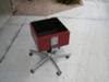 Our box cooker mounted on an old office chair