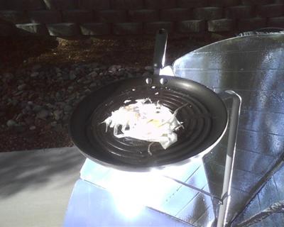 Frying an egg...sunny side up.
